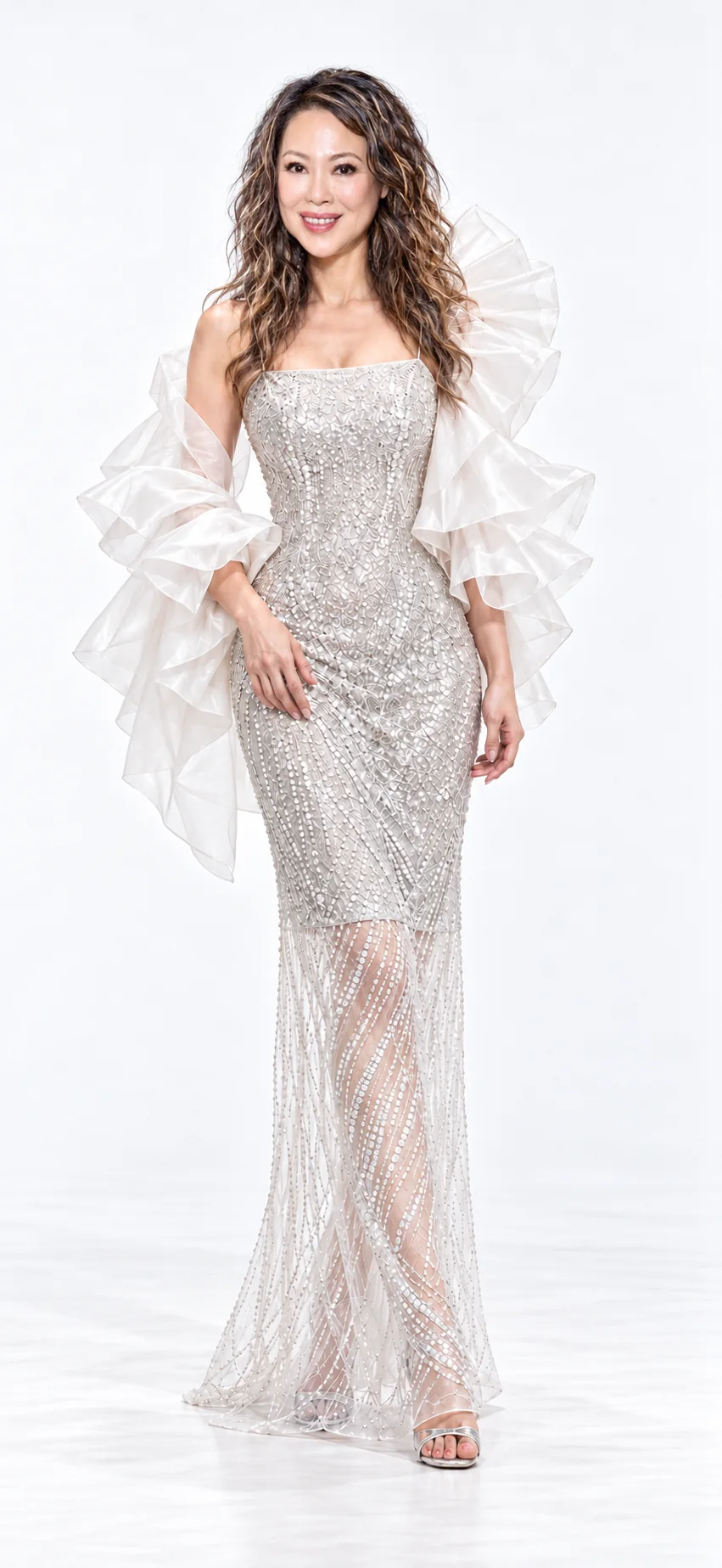 Sue Wang in a pearl gown with sculptural translucent ruffles